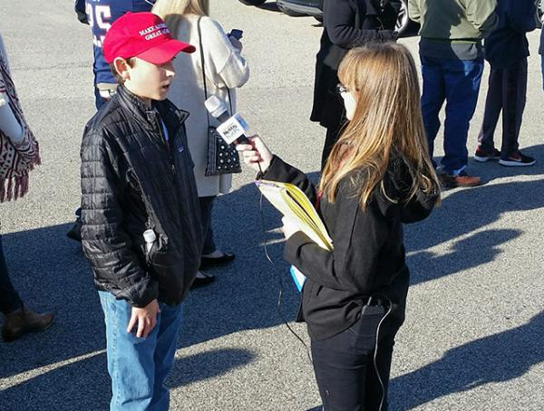 Kaitlin interviews a Trump supporter at rally in rally in Portsmouth, New Hampshire