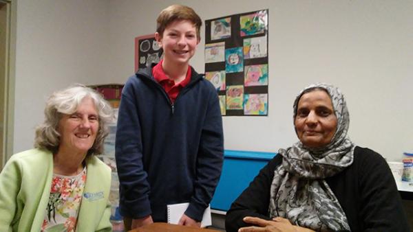 Ruqayya Basharat (far right) Robert Gardner (center) Priscilla Adams, Refugee Academic Success coordinator at Catholic Charities in Camden NJ.