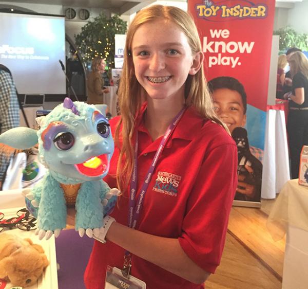 Kid reporter Skylar Yarter with Furreal Friends Torch My Blazin' Dragon from the Toy Insider Hot 20 list. This toy breathes flame-colored mist that can "toast" a color-changing marshmallow treat.