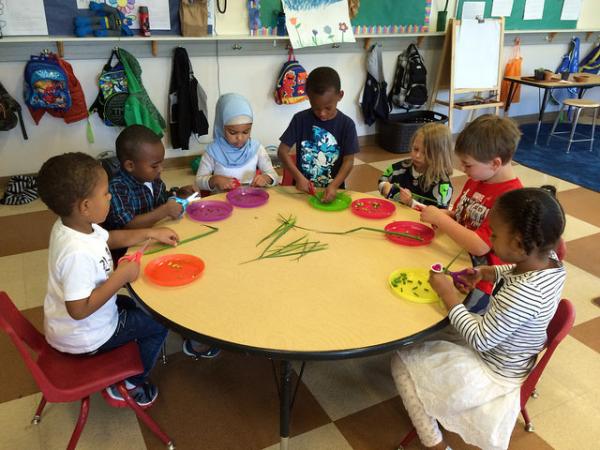 Preschool children learn about healthy eating. Studies show that a quality education early in life offers lasting benefits.