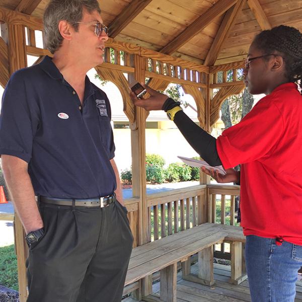 Alaa interviews voter Carter Cheatum.