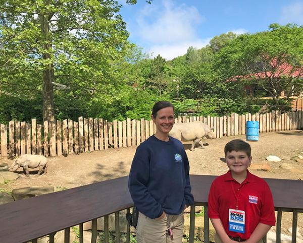 Nolan with Claire Winkler, animal keeper at the Cleveland Metroparks Zoo in Ohio.