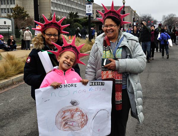 A family at the start of the March