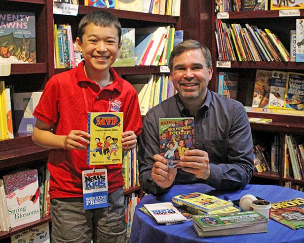 Max with David Kelly at a book-signing event in Dedham, Massachusetts