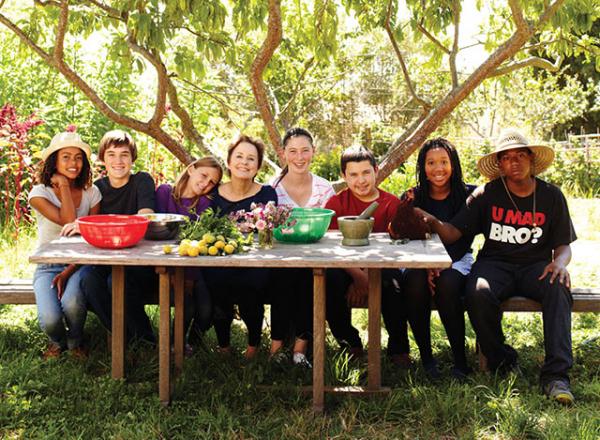 As part of her Edible Schoolyard Projects, Chef Alice Waters (center) encourages schools to create gardens, allowing students to grow their own fruits and vegetables. Waters co-founded Chez Panisse, one of the country’s first farm-to-table restaurants, in 1971. 