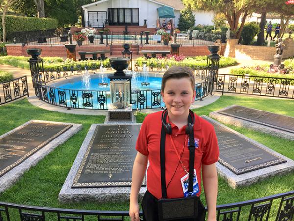 Ryan at Elivs's gravesite