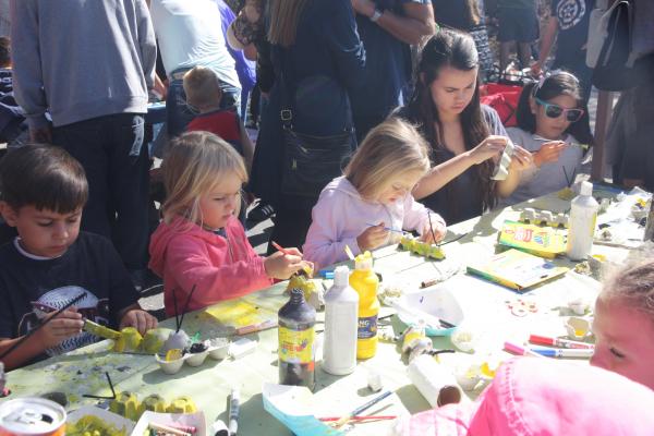 Kids work on their butterfly creations at the festival. Photo courtesy of the author