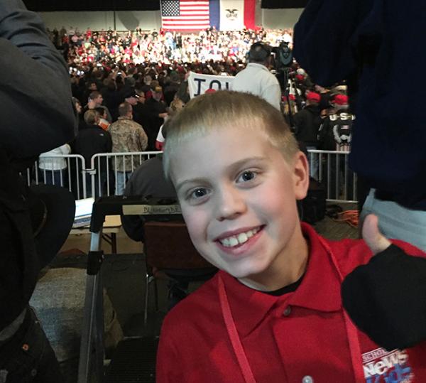 Kid Reporter Brandon getting ready to listen to President-Elect Trump give his speech. 