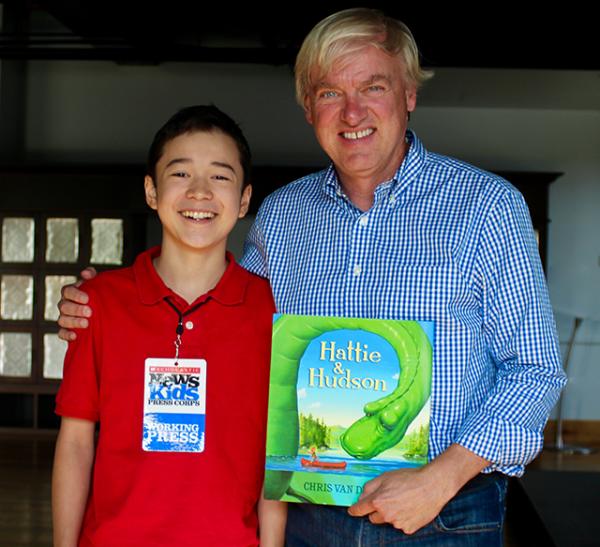 Max with children’s author and illustrator Chris Van Dusen.