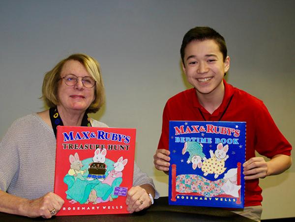 Max and Rosemary Wells holding Max and Ruby books at the Wellesley Free Library in Massachusetts