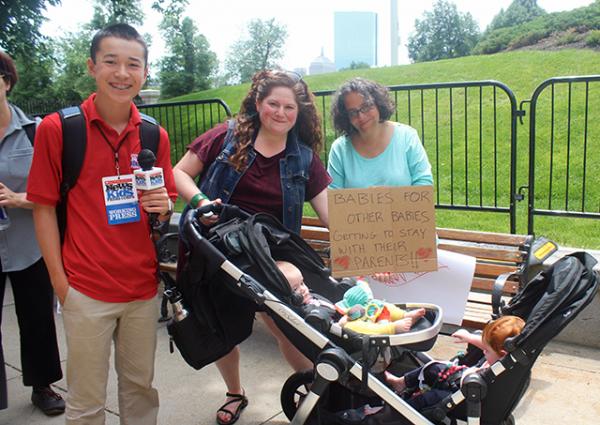 Rabbi Margot Meitner, who lives in Boston, attended the rally with her two young children