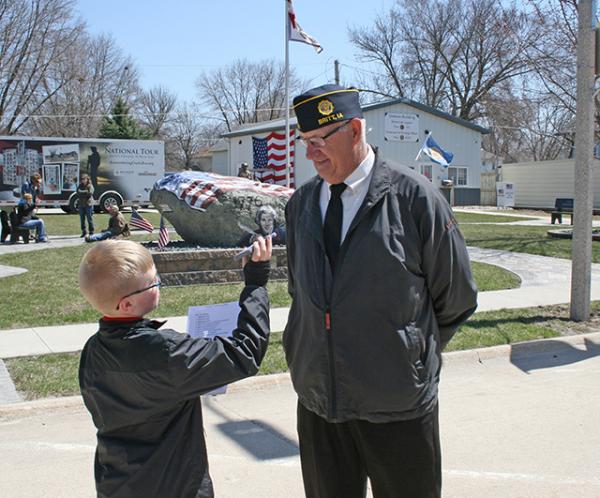 Brandon interviewing veteran Ken DeWaard about his thoughts on the memorial.