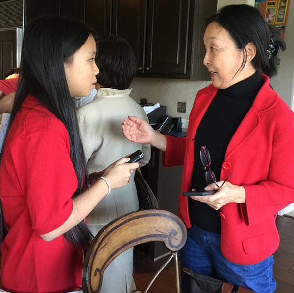 Bridget talks with Alice Yi, president of the Austin chapter of the Asian Pacific Islander American Public Affairs Association (APAPA).