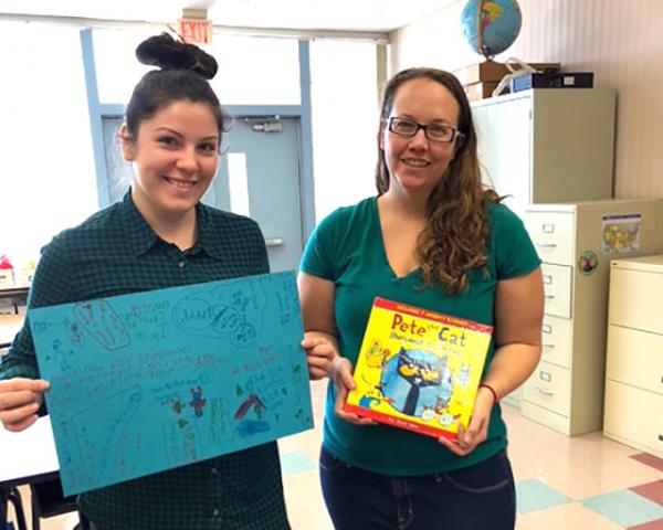 Survivors Chrystal Nelson and Traci Wickham collected 1,000 new books for children.