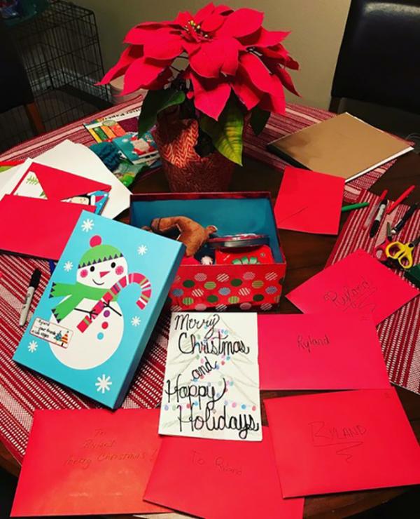 Handwritten holiday cards for a young shooting survivor in Texas 