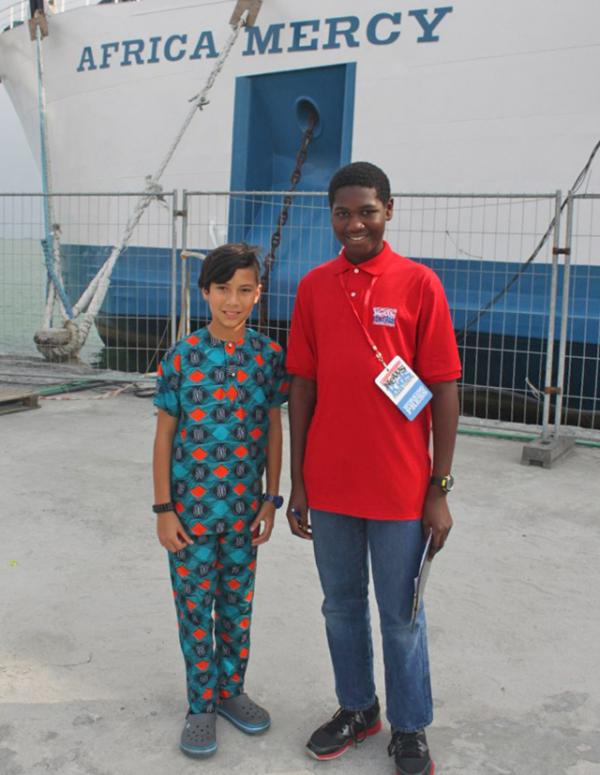 Caleb with B.J. Barki on the dock