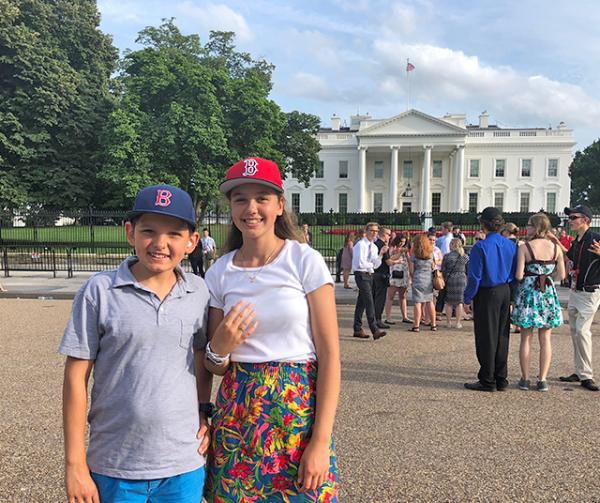 Lilian and her brother in front of the White House