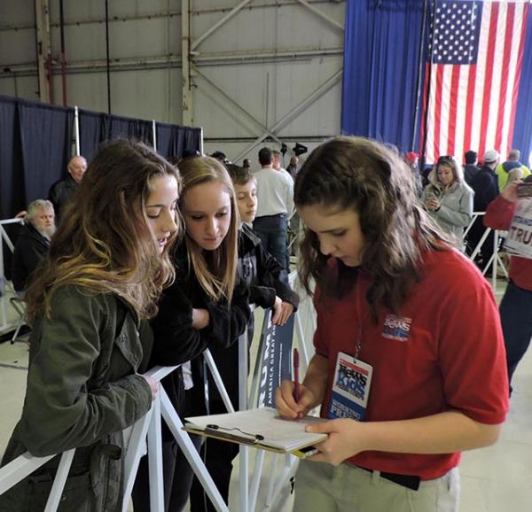 Kyra interviews students at a Trump rally in Columbus, Ohio, on March 1.