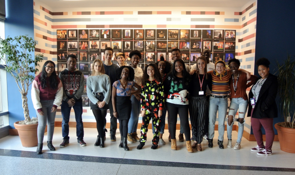 Local students gather at the Ali Center’s Wall of Respect.