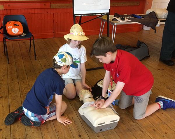 Martin practising CPR at the Defibrillator training day
