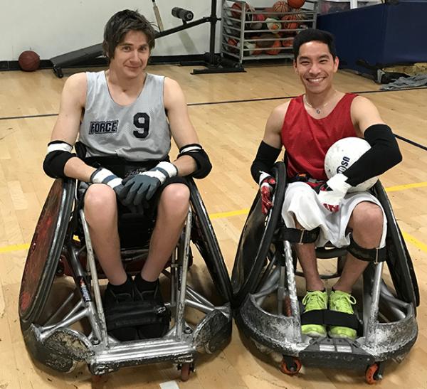 Steven Toyoji (right) with teammate Grayson Holden at a wheelchair rugby practice.