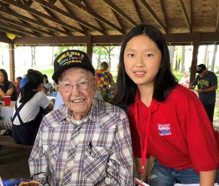 Teresa with J. B. Caldwell, a decorated U.S. war veteran, at his 93rd birthday party in North Carolina