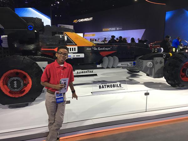 Titus in front of the Lego Batmobile