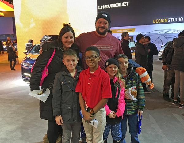 Titus with a family from Warren, Michigan Titus with a family from Warren, Michigan