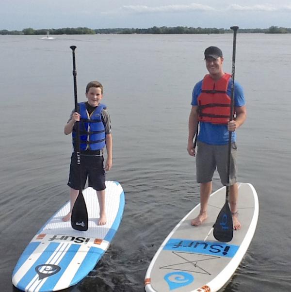 Ryan with record-holding paddleboarder Alex Linnell Ryan with record-holding paddleboarder Alex Linnell