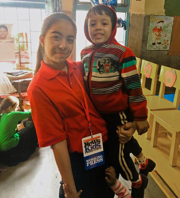 Ananyaa with children at the orphanage