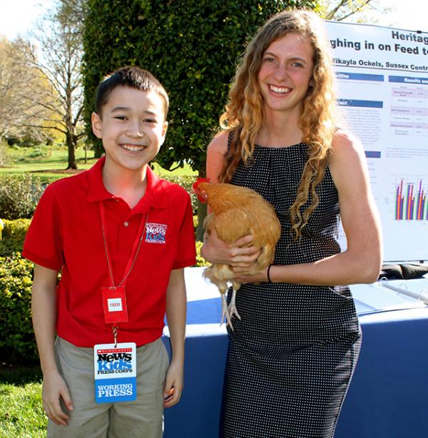Max and Mikayla Ockels with her chicken, Liberty, on the White House lawn
