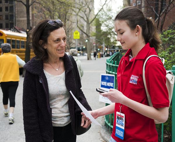 Charlotte talks with voter Caroline Blum in New York City.