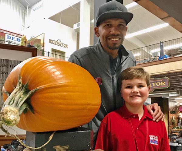 Nolan and Chef Baity at the Extreme Pumpkin Carving Event. Hartville Marketplace, Hartville Ohio (photo by Mary Pastore)