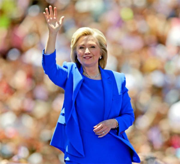 Former Secretary of State Hillary Clinton waves to supporters on June 13 at a park on Roosevelt Island in New York City.