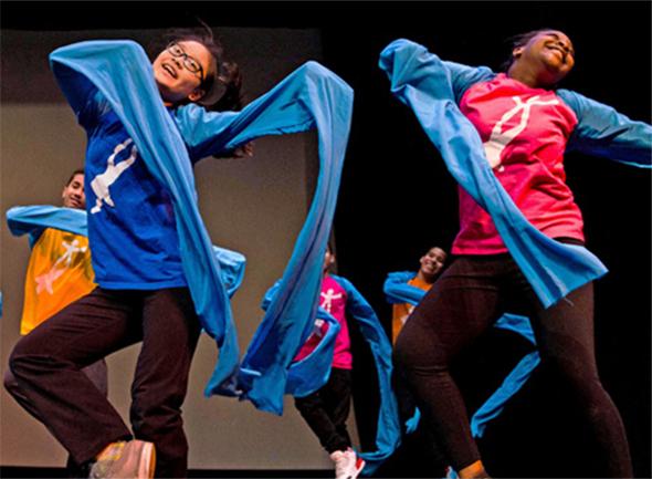 Children from the National Dance Institute in New York City perform a Chinese dance. Their performance was part of a cultural exchange program involving children from the United States and China.
