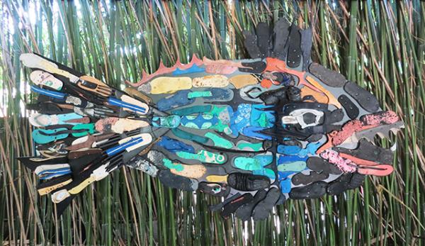 The Flip Flop Fish sculpture is made entirely of flip flops that have been washed ashore on beaches.