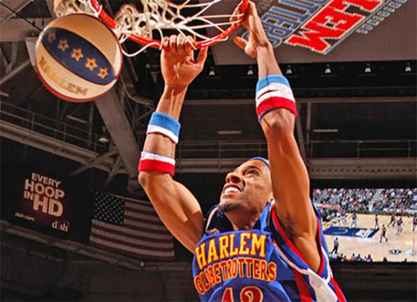 In honor of their 90th anniversary, the Harlem Globetrotters are spreading cheer beyond the basketball court.