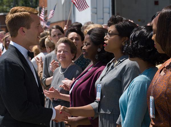 Katherine G. Johnson (Taraji P. Henson), flanked by fellow mathematicians Dorothy Vaughan (Octavia Spencer) and Mary Jackson (Janelle Monáe) meet the man they helped send into orbit, John Glenn (Glen Powell), in HIDDEN FIGURES.