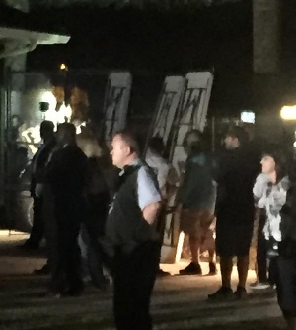 Security helped block out of the view of protesters from the outside Security helped block out of the view of protesters from the outside