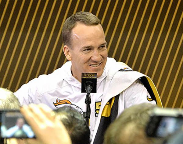 Quarterback Peyton Manning of the Denver Broncos answers reporters’ questions at Opening Night of Super Bowl 50 in San Jose, California. Manning is seeking his second Super Bowl ring.