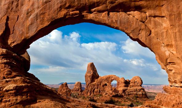 Arches National Park, which is located above the Colorado River in southern Utah, has more than 2,000 red sandstone arches. Arches National Park, which is located above the Colorado River in southern Utah, has more than 2,000 red sandstone arches.