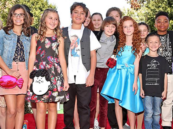 The cast of The Peanuts Movie at the world premiere in Westwood, California. Noah Schnapp (center) plays Charlie Brown.