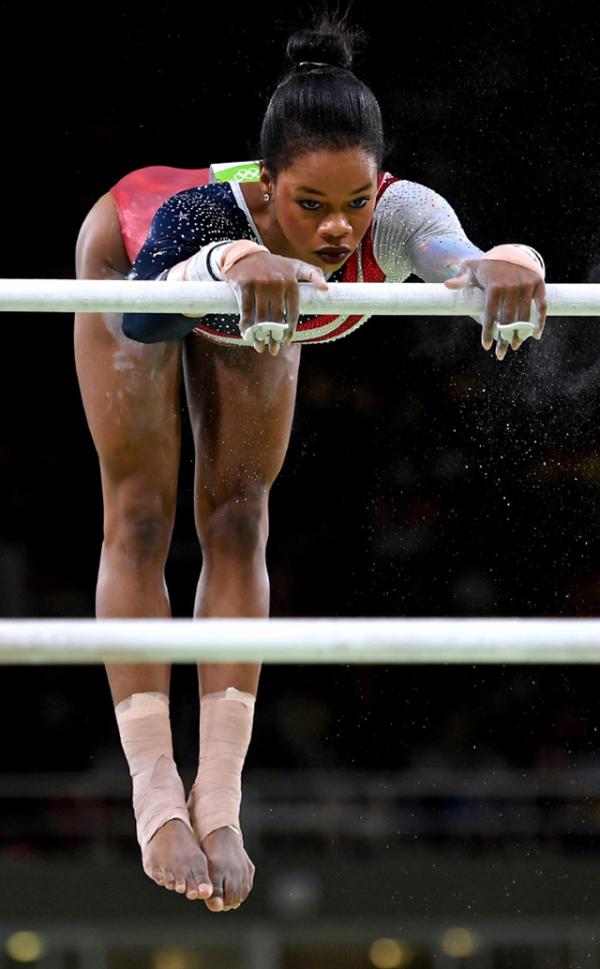 Gabby Douglas on the uneven bars at the 2016 Summer Olympics