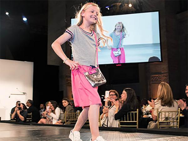 Maddie Hostetter models an outfit at a fashion show in New York City benefiting the Runway of Dreams Foundation. The organization helps bring adaptive clothing to differently abled people.