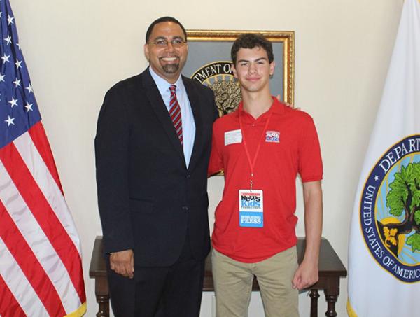 Erik with US Secretary of Education, Dr. John King