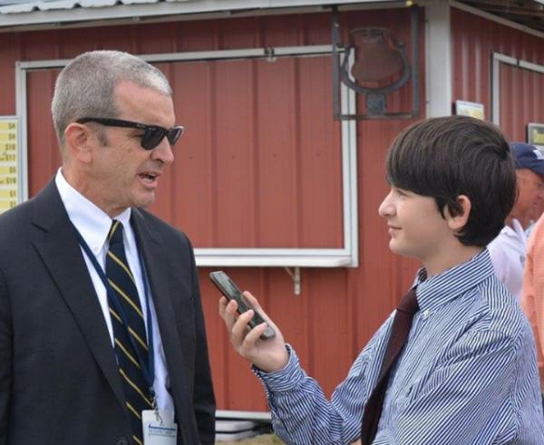 Benjamin interviewing George Bennett of the Palm Beach Post