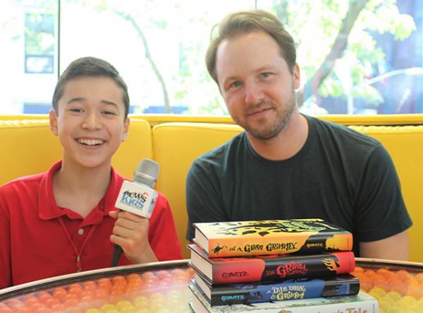 Maxwell with author Adam Gidwitz at Dylan’s Candy Bar in New York City