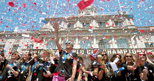 In a flurry of confetti, Abby Wambach (center) and her teammates celebrate the U.S. Women’s World Cup soccer championship at City Hall in New York City. 