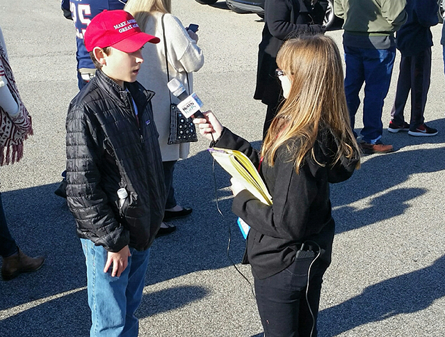 Kaitlin interviews a Trump supporter at rally in rally in Portsmouth, New Hampshire