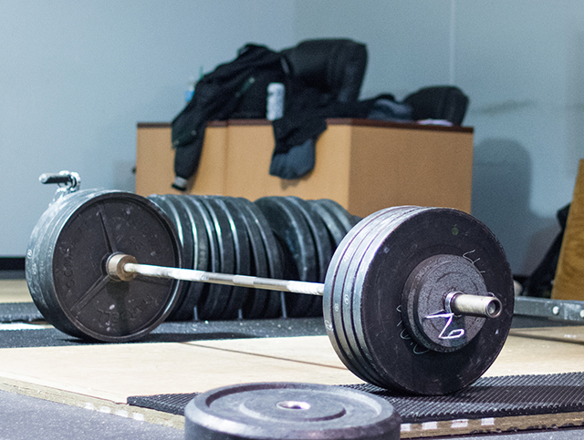 Loaded barbell (Photo by Lance Goyke)What does it take to be the best? Powerlifter Naomi Kutin found out.